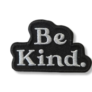 May include: Black embroidered patch with white lettering that reads "Be Kind."