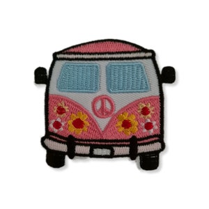 May include: Pink embroidered patch of a vintage van with a peace sign and flowers.
