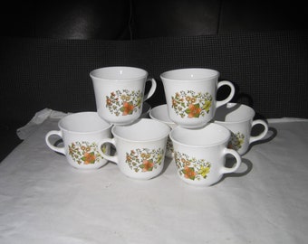 8 Corning Ware Cups "Wildflower Pattern" Microwavable use Made in USA.  Excellent condition, bright colors.