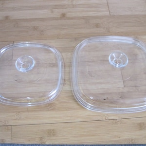 2 Pyrex Lids A-9-C and A-12-C lids for Corning Ware casseroles 8" x 8" and 10" x 10" square.