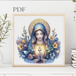 May include: A painting of the Virgin Mary holding a golden heart in her hands. She is wearing a blue robe and a golden halo. She is surrounded by flowers.
