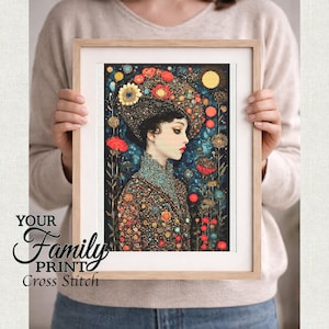 May include: Framed cross-stitch art featuring a woman in profile, adorned with a floral headdress and detailed clothing. The artwork is rich in color, with a dark background and vibrant floral accents. The text "YOUR Family PRINT Cross Stitch" is visible.