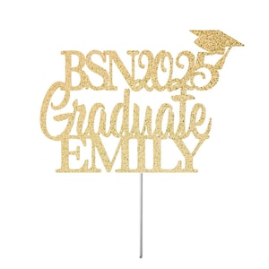 May include: Gold glitter cake topper with the text "BSN 2025 Graduate Emily" and a graduation cap.