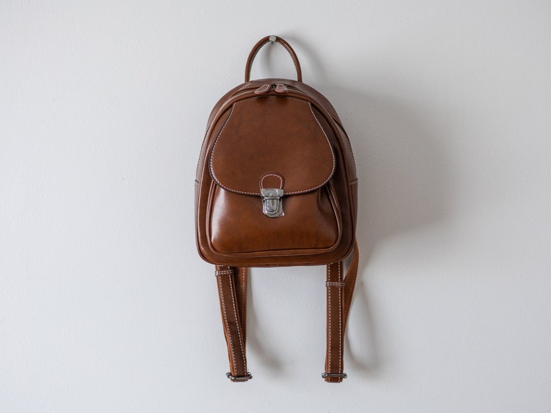 Genuine leather, Brown Mini backpack purse, multiple pockets, adjustable straps, carry on, Vacation, Spring Break. image 1