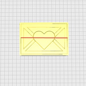 May include: A gold-colored envelope with a heart shape cut out in the center. A red line runs across the envelope.