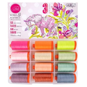 May include: A set of 12 spools of thread in a clear plastic container. The spools are arranged in three rows of four. The thread colors are neon pink, orange, yellow, light pink, beige, green, lavender, peach, teal, purple, brown, and gray. The container has a label that says "Fila Pink Neons & Neutrals Thread Collection".