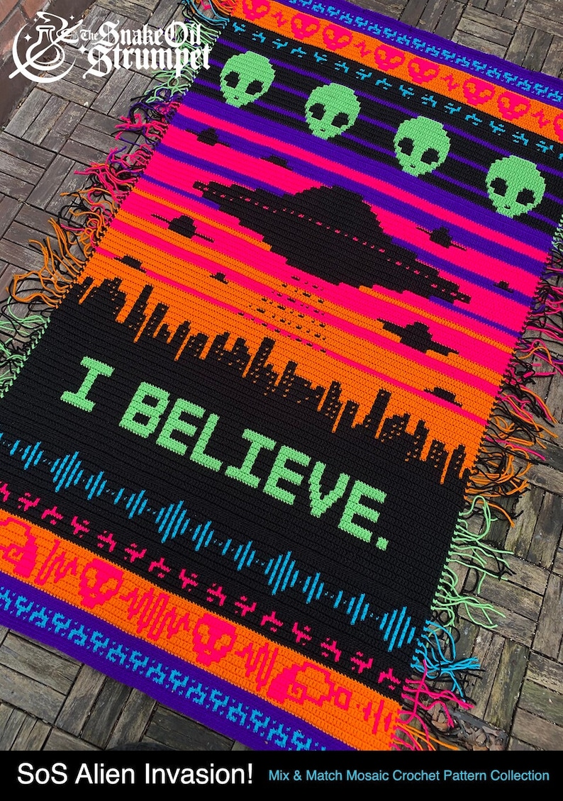 May include: A crochet tapestry with a black background and colorful stripes. The tapestry features a UFO, alien heads, and the text "I BELIEVE." The tapestry is fringed on all sides. The tapestry is part of a "SoS Alien Invasion!" Mix & Match Mosaic Crochet Pattern Collection.