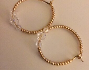 Champagne gold beaded hoop with gem bead in the middle