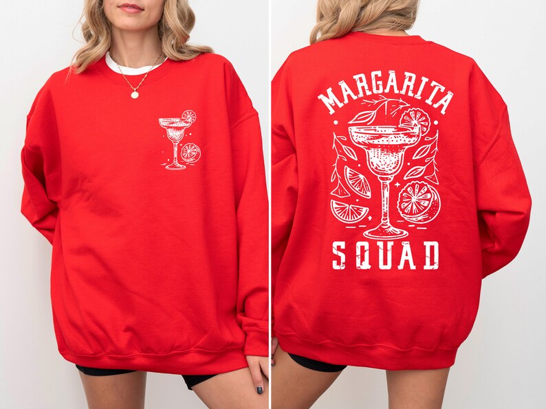 Peut inclure: Sweat-shirt rouge avec un graphique blanc d'un verre &agrave; margarita et le texte "Margarita Squad" au dos.