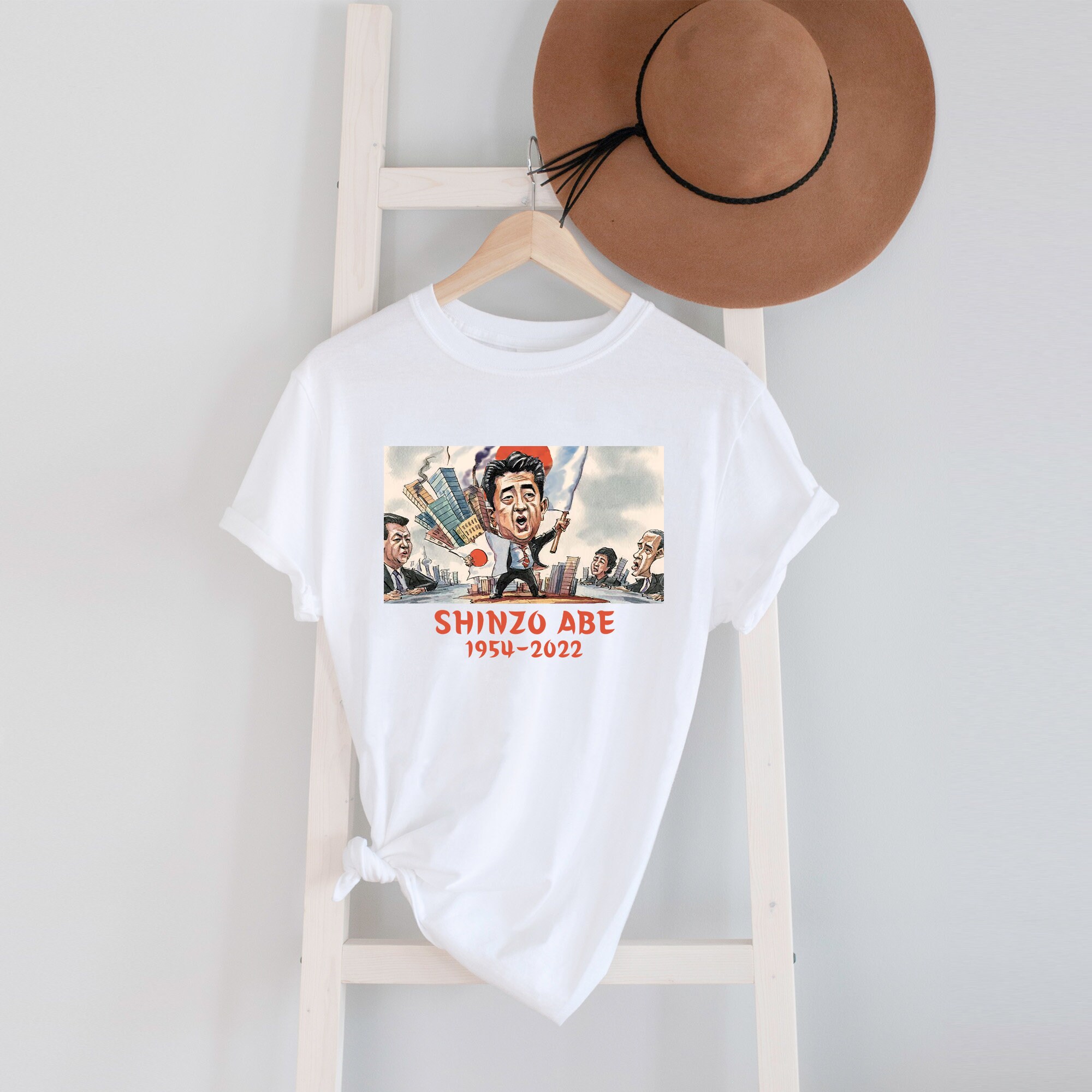Discover Shinzo Abe Shirt, Japan ex-PM injured Tee Shirt
