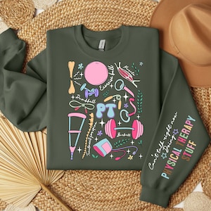 May include: A dark green sweatshirt with a colorful illustration of physical therapy equipment and the text "Can't talk right now Doing Physical Therapy Stuff".