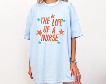 The Life Of A Nurse Shirt, Funny Nurse Life Tee, Medical Staff Graphic Top, Healthcare Worker T-Shirt, Gift For RN CNA LPN, Nurse Sweatshirt