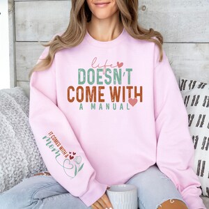 Life Doesn&#39;t Come With A Manual, It Comes With A Mom Sweatshirt, Mom Love, Gift for Mothers Day, Mother&#39;s Day Hoodie, Mom Life Sweatshirt