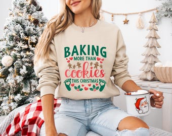 Christmas Pregnant Shirt for Mom, Christmas Pregnancy Announcement Sweatshirt, Baking More Than Cookies This Christmas, Mother To Be Gift