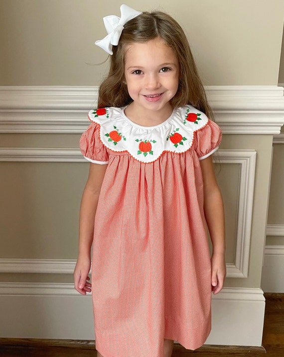 Pumpkin Thanksgiving bishop dress for Fall. Orange gingham, scalloped collar with embroidered pumpkins. Perfect for Turkey Day