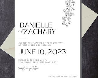 Black and White Wedding Invitation w/ Floral Graphic Canva Template