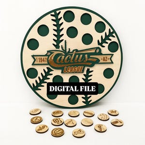 May include: A wooden baseball-themed display with a green and tan color scheme. The design features the text "Cactus League" and "1947 AZ". The words "DIGITAL FILE" are also present. Small wooden tokens with various designs are scattered below.