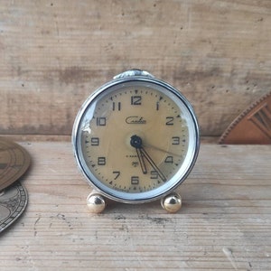 Vintage Slava small metal mechanical alarm clock made in USSR