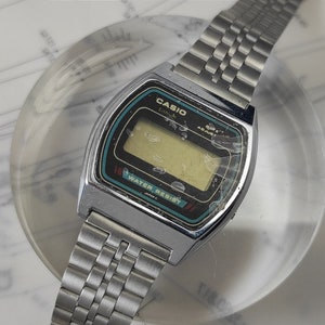 Vintage Casio Lithium watch B613W - not working, for parts or repair