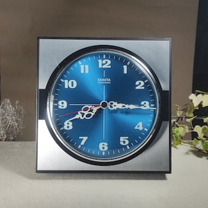 Vintage Exacta electronic wall clock made in Germany