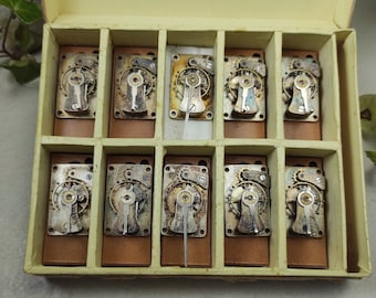 horloge vintage avec échappement à plate-forme - 9 rubis, 22 x 35 mm - lot de 10 pièces dans la boîte d'origine - pièces de pendule de cage/de cheminée