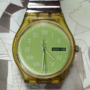 Vintage Swatch Ag 1997 green dial watch