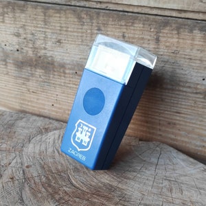 Vintage blue Varta pocket flashlight with Zagreb coat of arms