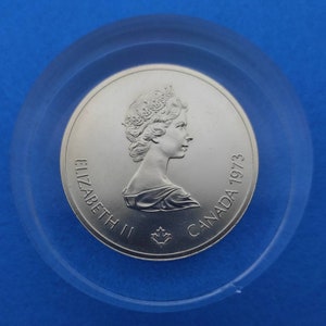 Pièce canadienne de 10 dollars en argent de 1973 XXIes Jeux olympiques de Montréal de 1976 - Carte du monde