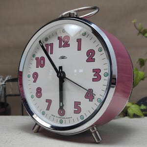 Vintage Prim alarm clock - pink case mechanical clock made in Czechoslvakia