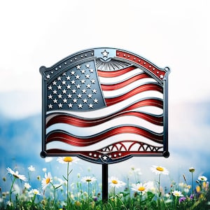 May include: A metal garden stake with a red, white, and blue American flag design. The flag is waving in the wind and has a star in the upper left corner. The stake is surrounded by white daisies.
