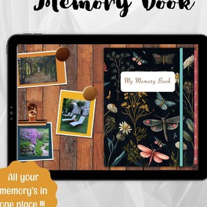 Puede incluir: Una tableta digital que muestra una maqueta de un libro de recuerdos con un diseño floral y el texto "My Memory Book". La tableta está sobre una superficie de madera con varias fotos sujetas a ella. El texto "All your memory's in one place!!!" se muestra debajo de la tableta.