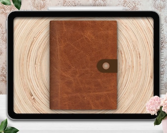 May include: A brown leather journal with a button closure sits on a wooden surface, displayed on a tablet. The journal has a textured appearance. The text at the bottom reads: PLANNER • DIGITAL PLANNER • HYPERLINKED • DIGITAL PLANNER • DIGITAL.