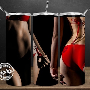 May include: Three stainless steel tumblers with a black background and a woman in a red bikini. The woman is shown from the waist up and is adjusting her bikini top.