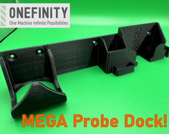 May include: A black 3D printed wall mount with the text "MEGA Probe Dock!" printed below. The mount has multiple compartments for holding various items.