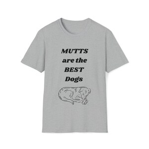 May include: A gray t-shirt with the text "MUTTS are the BEST Dogs" and a black and white illustration of a dog sleeping.