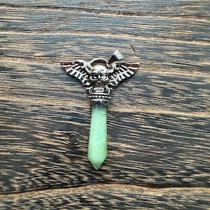 May include: A rustic wooden sign with the text "Welcome to our home" in white lettering. The sign features a distressed finish and a simple, inviting design, perfect for entryway decor.