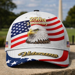 May include: White baseball cap featuring the American flag and a bald eagle graphic. The cap has the text "250th Anniversary" and "Veterans" in gold lettering. The design includes red and white stripes and blue stars.