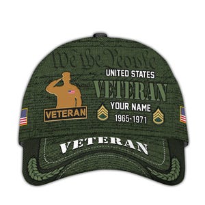 May include: A green baseball cap with the text "United States Veteran" and the years "1965-1971". The cap features an illustration of a saluting soldier, the American flag, and the words "We the People".