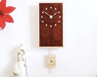 Exotic Wood Wall Clock. Pendulum Wall Clock in burr madrone with a ripple sycamore pendulum and inlaid sycamore dots. Small Rectangle Clock.