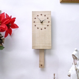 Wooden Wall Clock. Pendulum Wall Clock in ripple sycamore with inlaid mahogany and sycamore diamonds. 150 Series - Rectangle/Diamonds.