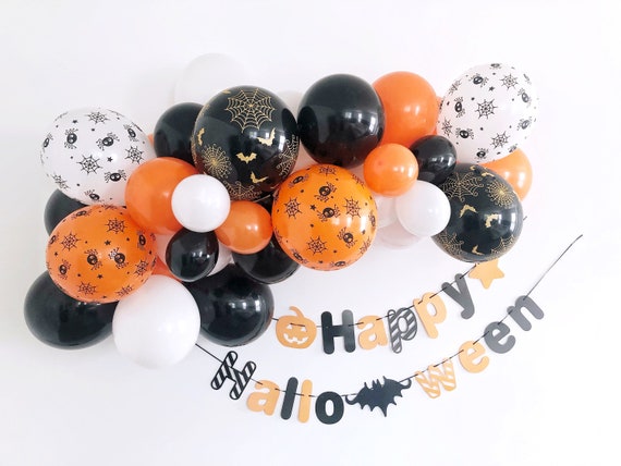 5 Balloon DIYs for Your Holiday Party! - A Beautiful Mess