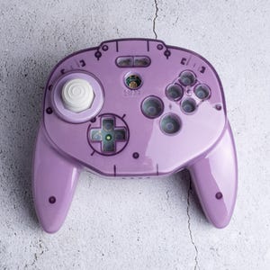Niestandardowe obudowy do kontrolera Tribute 64 (marka Retro-Bit) – Atomic Purple