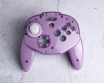 Niestandardowe obudowy do kontrolera Tribute 64 (marka Retro-Bit) – Atomic Purple