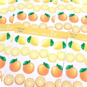 May include: Four sheets of stickers featuring illustrations of lemons, oranges, and citrus slices. The stickers are white with a yellow background and the text "Citrus Fun" and "Dear Bunny" on each sheet.