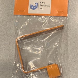 May include: Orange plastic tool for changing H9/H11 light bulbs. The tool is packaged in a clear plastic bag with a label that reads "Bloc Products Inc."