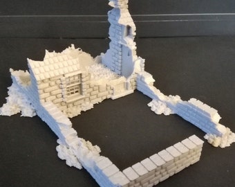 May include: A white, 3D printed model of a ruined building with a collapsed chimney and a brick wall surrounding a small courtyard.