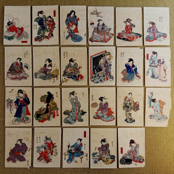 Antique Japanese miniature woodblock prints by Utagawa Kunisada, set of 23