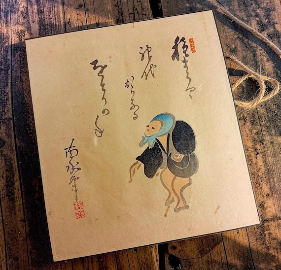 Antique Japanese surimono with a traveller figure, woodblock print