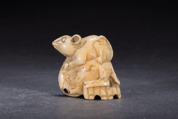 Antique (Vintage) netsuke, Mouse on a skull, special type of white wood