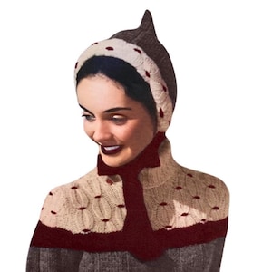 Peut inclure: Un modèle de tricot vintage pour une tenue d'hiver pour femme, comprenant un chapeau, un col roulé, des mitaines et un pull. Le modèle date des années 1940 et présente une palette de couleurs marron, blanc et rouge. Le texte sur le modèle indique "1940s The Workbasket Vintage Patterns".